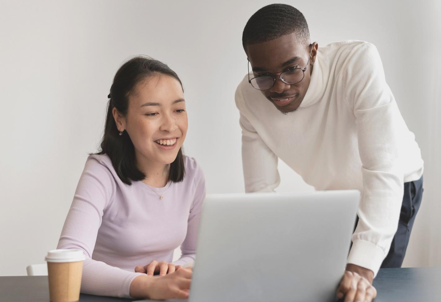 Early classroom setup with students working on coding projects